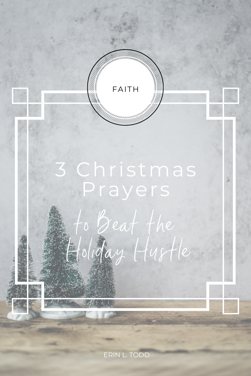 Three Christmas trees on a wooden table for a faith centered holiday pray these 3 Christmas prayers